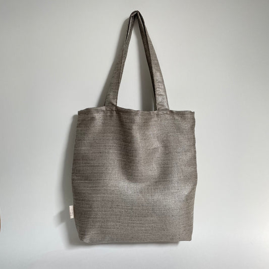 Model M Linnenlook goud